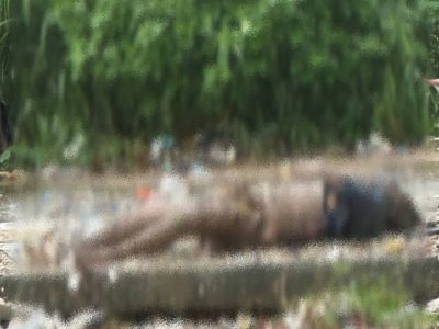 西港河道浮尸已经被打捞上岸，尸体已呈一定程度巨人观